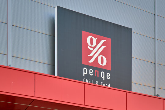 Exterior signage of Penge chill and food store on modern building. Miercurea Ciuc, Romania - July 14, 2024. 