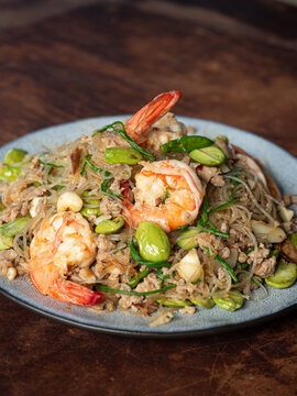 stir fried glass noodles with shrimp, bitter beans and acacia vegetable