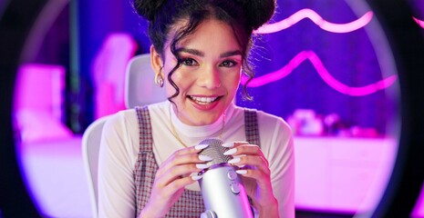 Girl, ring light and smile in home with portrait, audio and click on mic, broadcast and sensory...