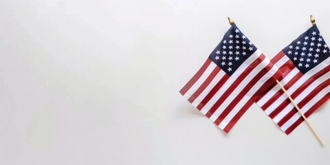 Obraz premium American flags against white background. Flat lay with copy space. Happy Labor Day or 4th july concept.