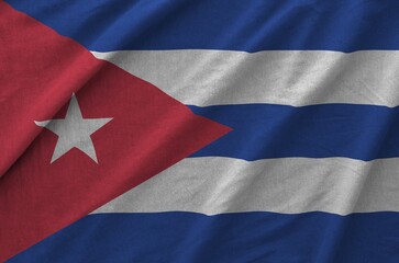 Cuba flag depicted on folded wavy fabric of old cloth close up