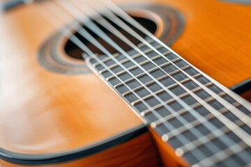 Fototapeta premium Serene Musician - Close-up of Detailed Acoustic Guitar on Performer's Lap with Wood Grain and Strings in Focus