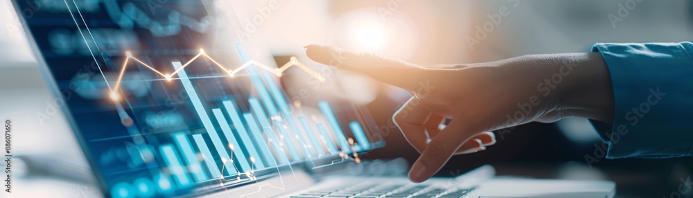 Aufkleber the hands of a financial advisor gesturing towards a financial growth chart on a laptop screen, with