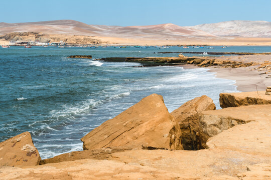 Desert Meets Ocean. Paracas Reserve&rsquo;s serene coastline juxtaposes desert and sea.