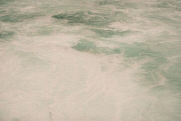 close up on the raging water in the river