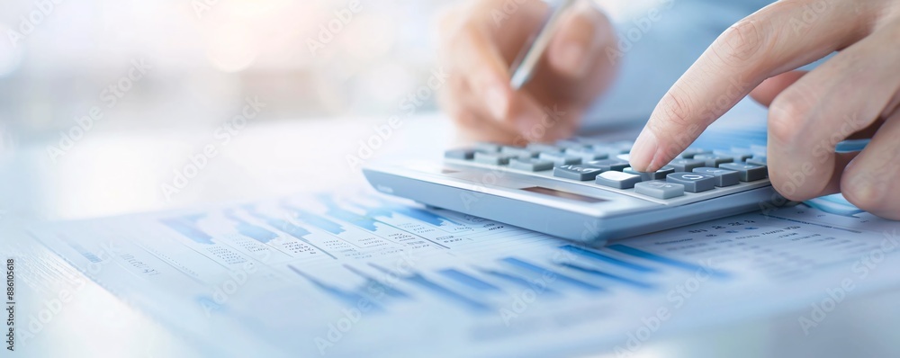 Poster a consultant's hand using a calculator to explain tax returns to a client, close-up shot with room f