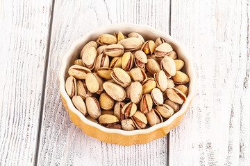 Salted tasty pistachio nuts heap