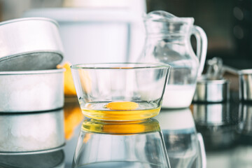 Fresh ingredients egg yolk in glass bowl