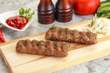 Kebab with beef served onion