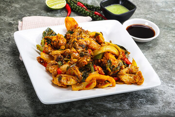 Vietnamese cuisine - fried frog with vegetables