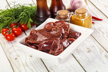 Raw chicken liver uncooked in the bowl