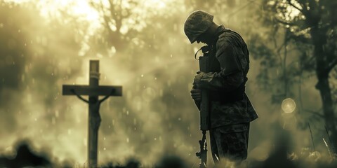 Soldier stands in front of cross holding rifle in camouflage uniform. Man prays contemplates in serene nature setting with trees, bushes. Military personnel seeks spiritual guidance in peaceful.