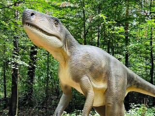 Wawel Dragon. Dragon from Lisowice.Archozaur dinosaur. Realistic figure of an Archozaur dinosaur inforest park in Kazimierz Sosnowiec. Prehistoric predator fascinating element of the landscape. © Chawran