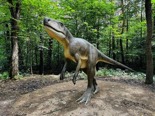 Wawel Dragon. Dragon from Lisowice.Archozaur dinosaur. Realistic figure of an Archozaur dinosaur inforest park in Kazimierz Sosnowiec. Prehistoric predator fascinating element of the landscape. © Chawran
