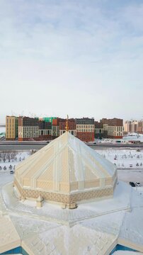 Modern mosque in winter overlooking the embankment