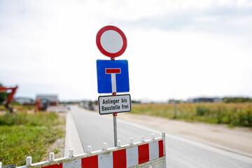 No entry round red road traffic sign on the road, construction site area