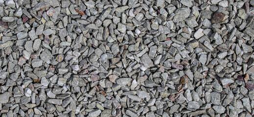 texture of gravel stones on ground background	
