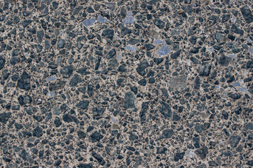  Background texture of gray stone wall with small pebble stones