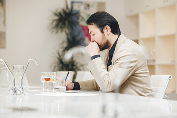 Thoughtful Sommelier Tasting Various Spirits Being in Wine school