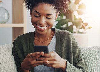 Black woman, smartphone and happy in home for social media, application and connection with smile. Female person, technology and cheerful for good news, update or email in house on weekend or day off