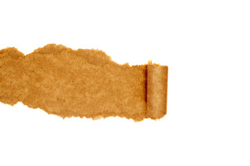 A torn piece of paper with a brown edge