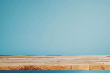 Wooden table top with a pastel blue background for a product display presentation concept, an empty and clean wood board on a color wall minimalism background 