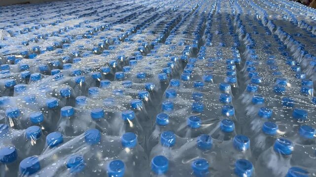 Top of the water bottle packed with plastic at a railway station in India. Railneer