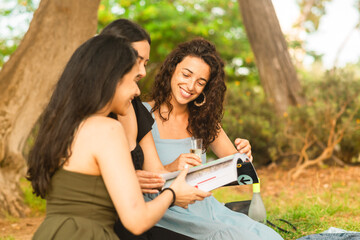 tourists girlfriends reading a book during travel