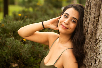 woman relaxing in the park with beautiful smile