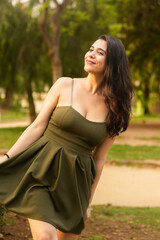 woman relaxing in the park with beautiful smile
