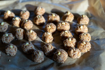 Lots of small nut cookies with whole almonds in the middle