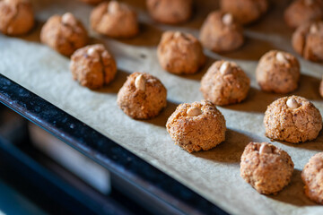 Lots of small nut cookies with whole almonds in the middle