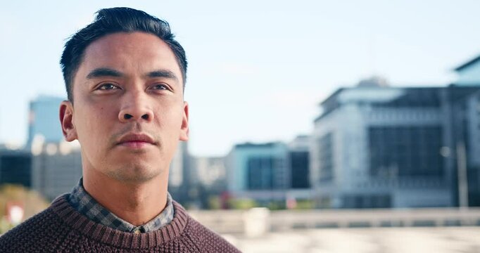 Portrait Of Young Businessman In The City