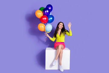 Fototapeta premium Photo of adorable positive nice girl dressed stylish clothes hi empty space isolated on purple color background