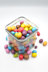 Chocolate covered nuts in various colors
