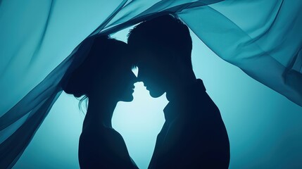 Intimate moment captured Closeup silhouette of bride and groom embracing under a veil, a romantic symbolic image.