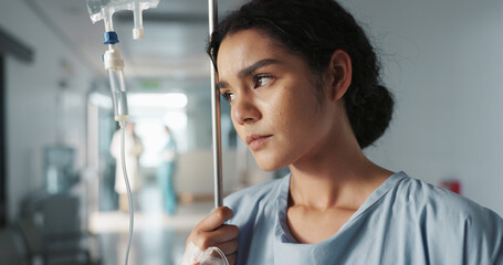 Woman, patient and iv drip, healthcare at hospital for wellness, burnout and medicare treatment....