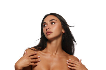 Fototapeta premium Portrait of beautiful young woman with tanned body, nude makeup and spotless well-kept face, bare shoulders isolated on white background. Beauty, skin and body care, cosmetology and cosmetics concept