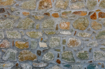 Fototapeta premium Old castle stone wall texture background. Stone wall as a background or texture.