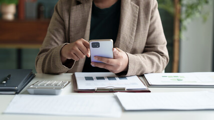 Businesspeople thoughtful using smartphone browsing internet