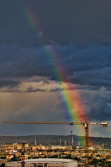 rainbow over the city's industrial zone