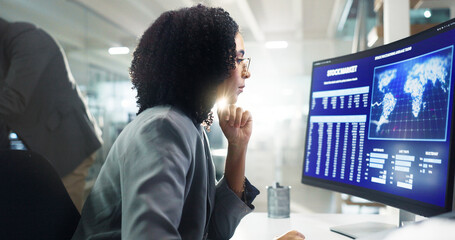 Thinking, statistics and business woman on computer in office for stock trading, research and finance. Cryptocurrency, fintech and person on pc screen with global market, chart and data analysis
