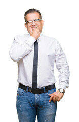 Fototapeta premium Middle age bussines arab man wearing glasses over isolated background looking confident at the camera with smile with crossed arms and hand raised on chin. Thinking positive.