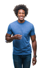 Afro american man drinking glass of water over isolated background with a happy face standing and smiling with a confident smile showing teeth