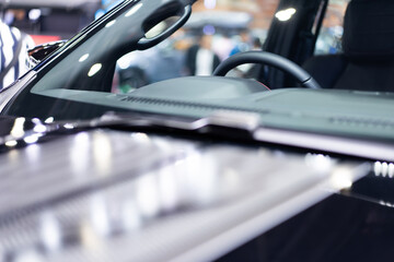 Front console and steering wheel Looking through the windshield Focus on a specific point