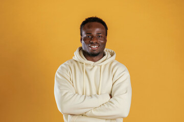 Black guy is against yellow background