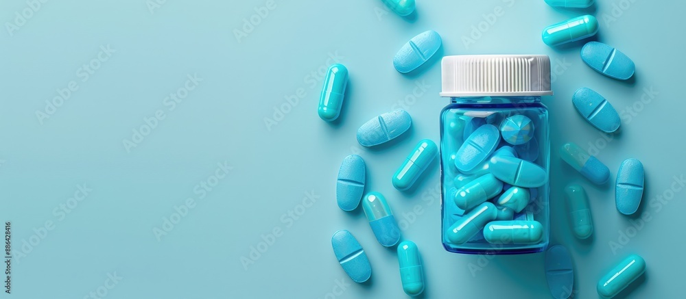 Aufkleber antibiotic medication in a container on a white and blue background with copy space image for drug p