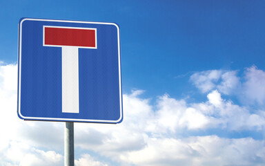 Dead end road sign. No through road traffic sign. Vehicle will not be able to pass through. Information for drivers on square plate board. Red and white colors. Clouds as background. Close up.