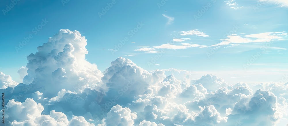 Poster tranquil scene of blue sky with fluffy cumulus clouds illustrates a serene and calm clear sky landsc