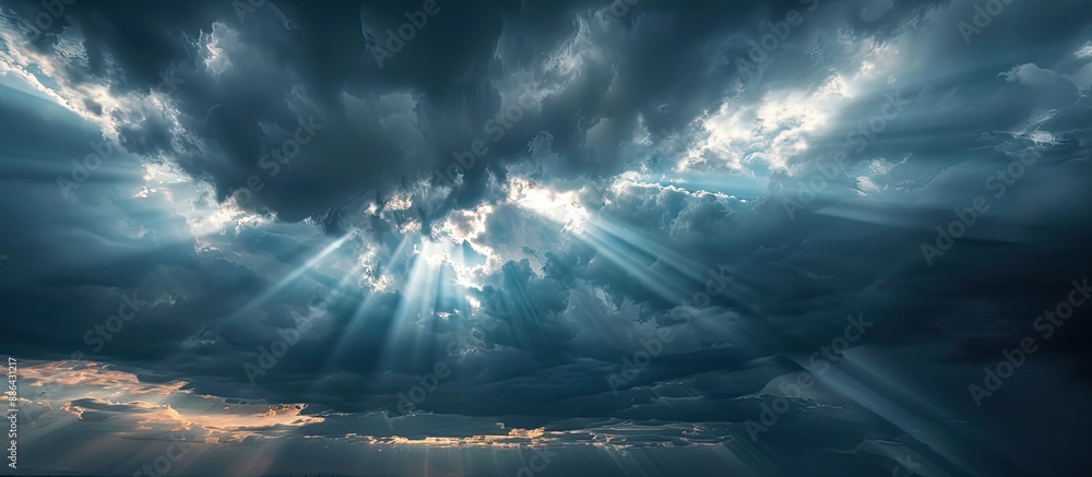Poster The sun shining through dark clouds creating a beautiful silhouette with a copy space image